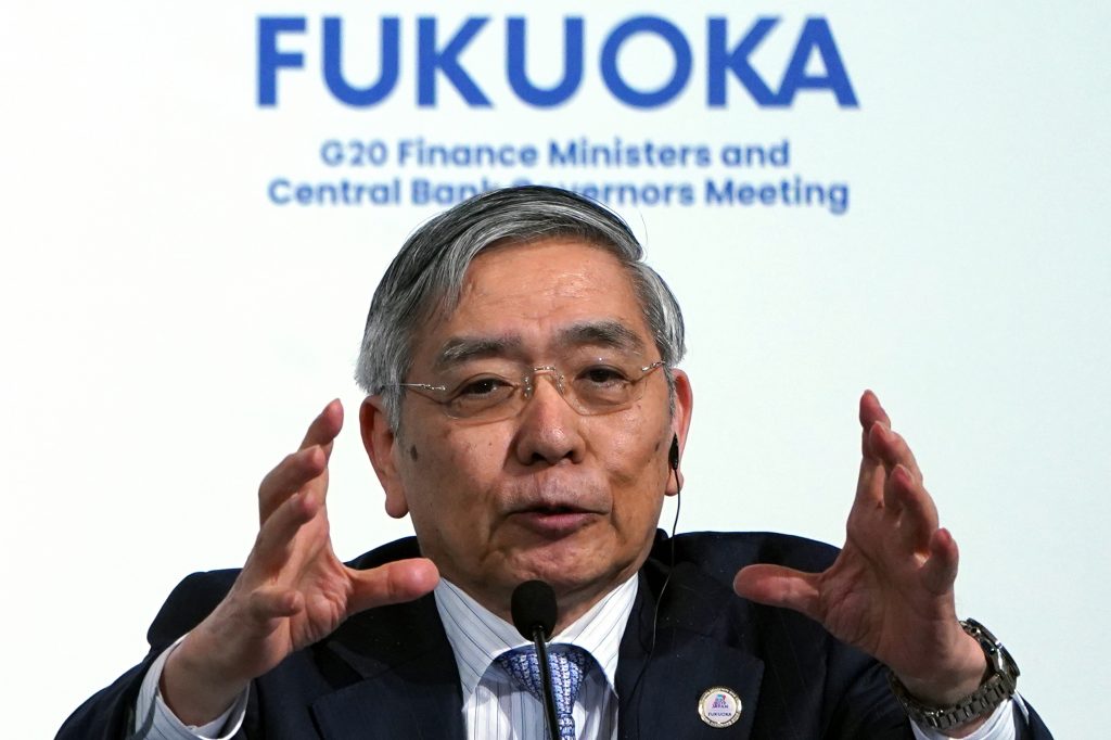 Bank of Japan lifts growth outlook, keeps easy money policy
