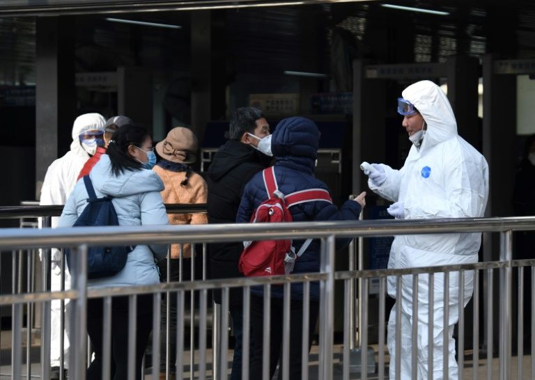 China seals off more cities as virus toll climbs