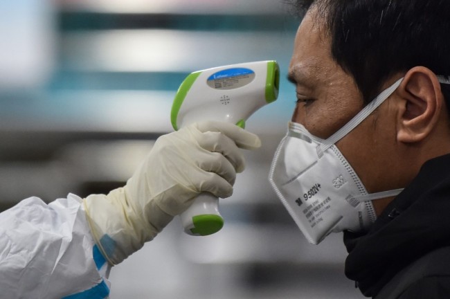 China reports 1,975 confirmed cases of new coronavirus pneumonia, 	56 deaths