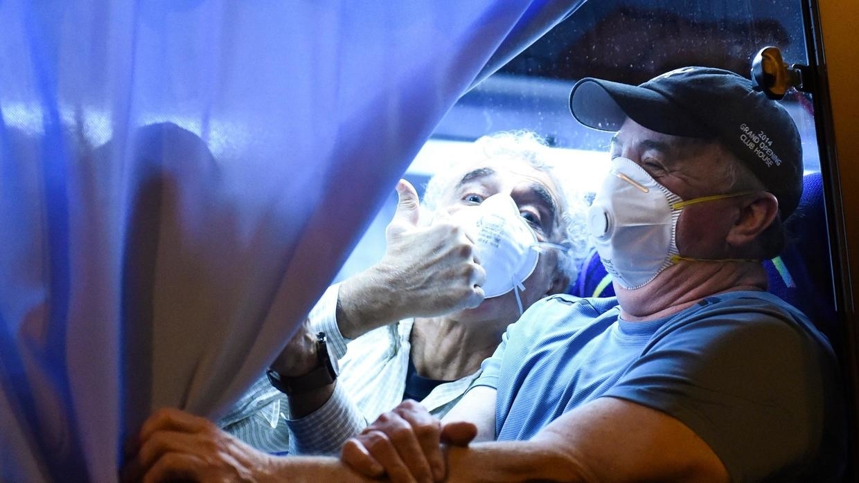 14 test positive among US plane evacuees from Japan virus ship
