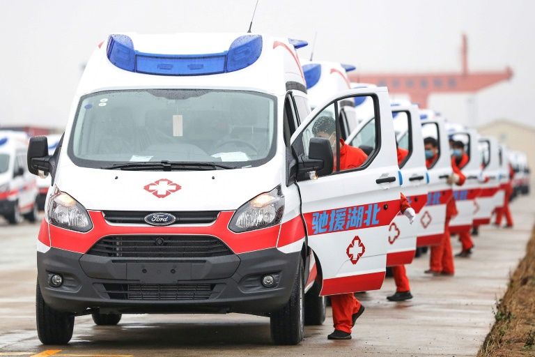 Virus death toll soars as China changes counting methods