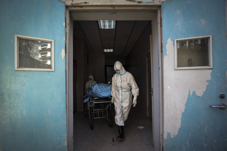 China counts more virus deaths, illnesses as impact broadens