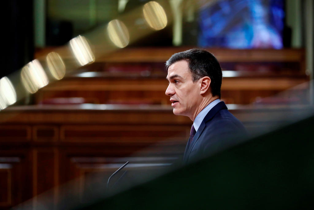 Spain PM warns ‘very hard days ahead’ as virus toll tops 1,300
