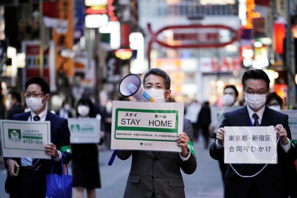 Japan to extend state of emergency over virus: reports