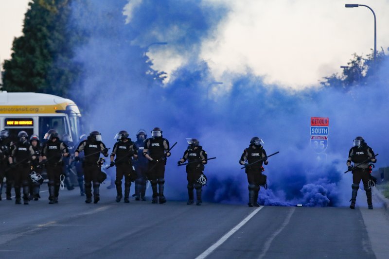 Protests over police killings rage in dozens of US cities