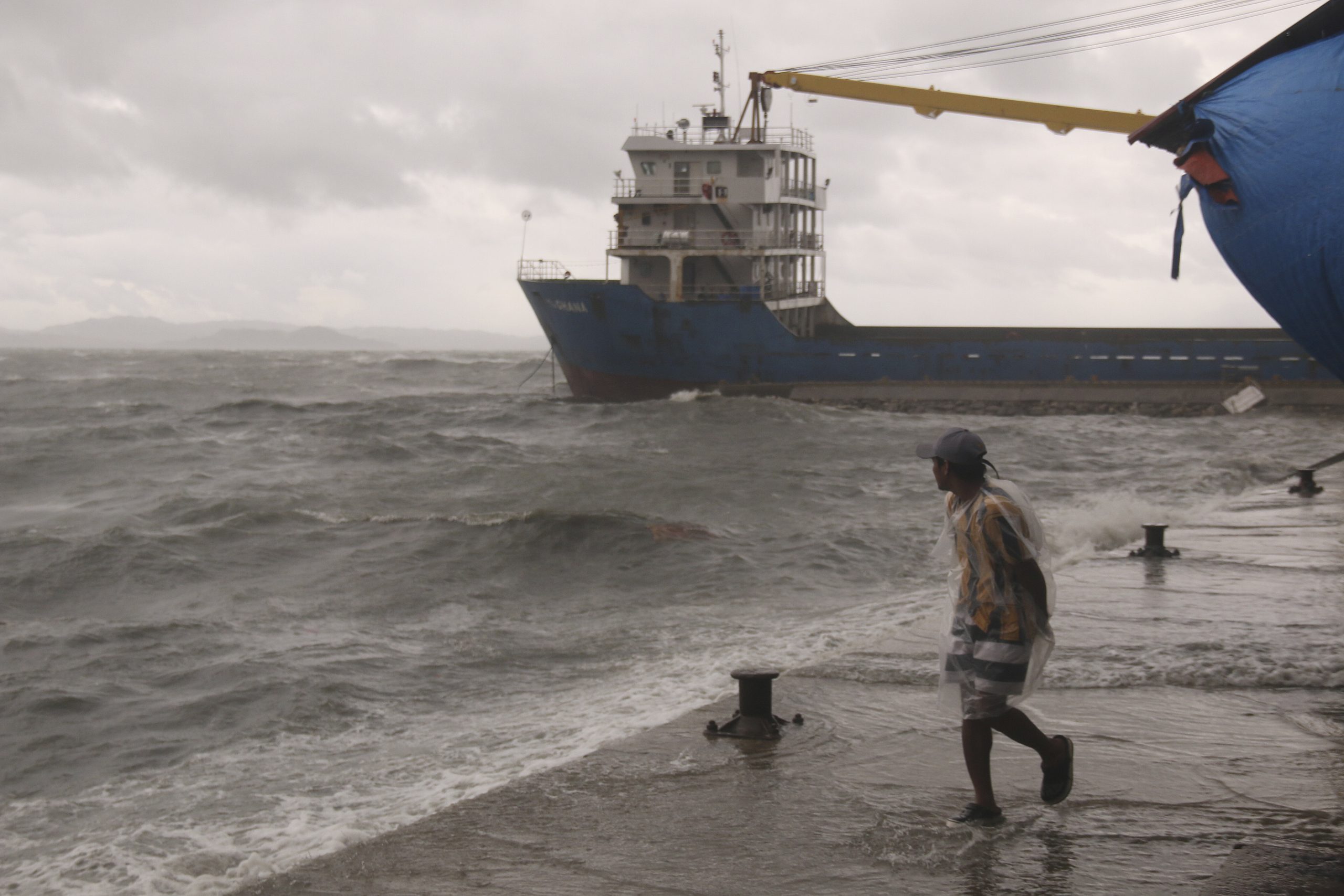 Philippines riding out typhoon after virus slows evacuations