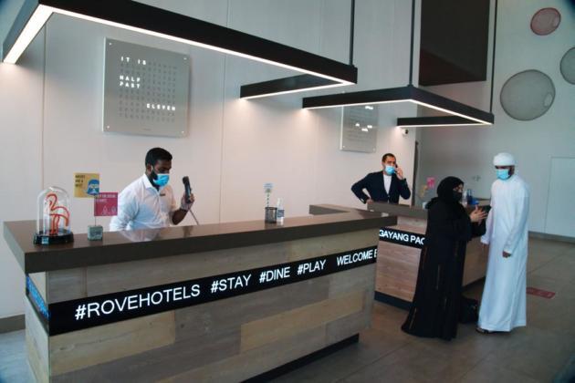 Thermometers in hand, Dubai opens for tourists amid pandemic