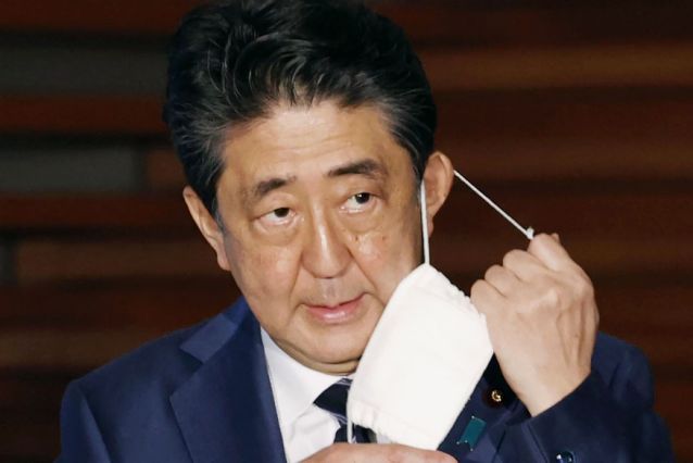 Japan’s PM sets mark for days in office amid health concerns