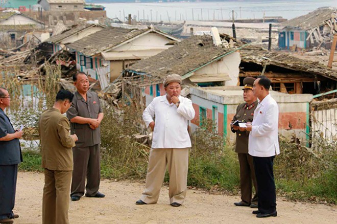 Seeking unity, NKorea’s Kim vows to overcome typhoon damage