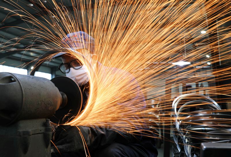 China’s December factory activity slows, recovery on track