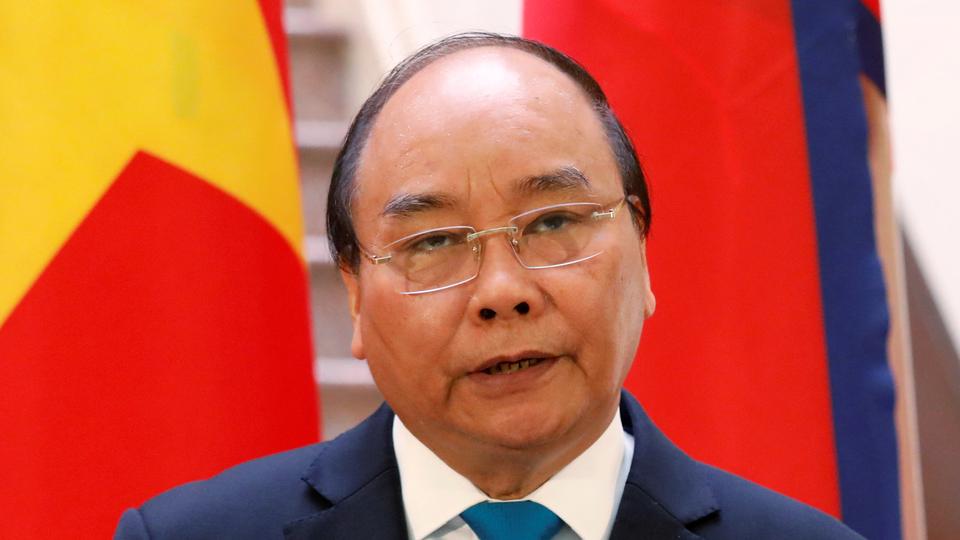 Vietnam’s pandemic response leader sworn in as president