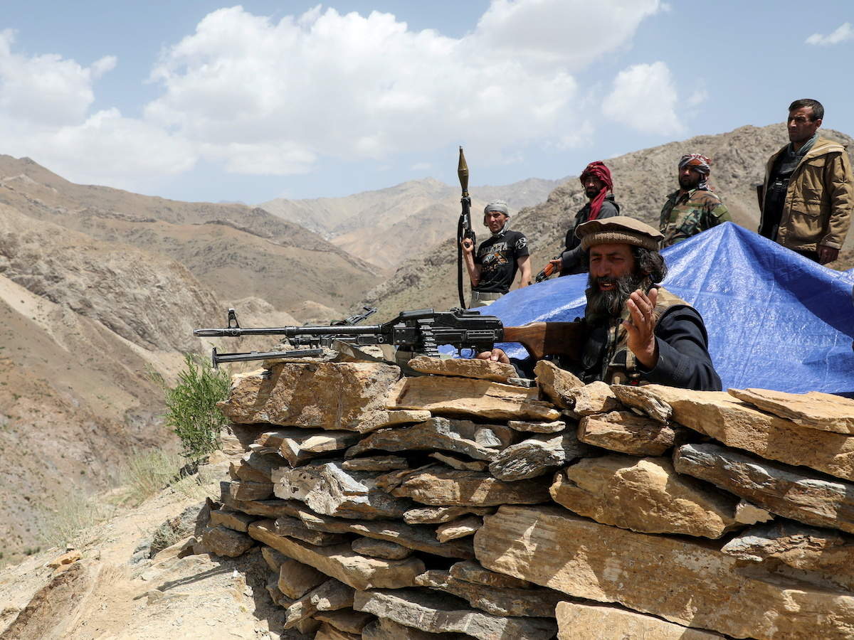 Taliban surround Afghan city as commandos launch counterattack