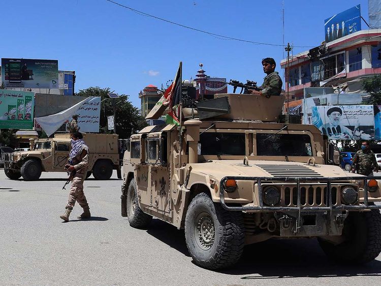 Taliban all smiles in captured Afghan city as northern blitz rolls on