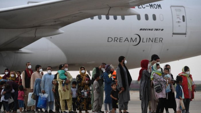 As thousands flee Afghanistan, some refugees want to go back