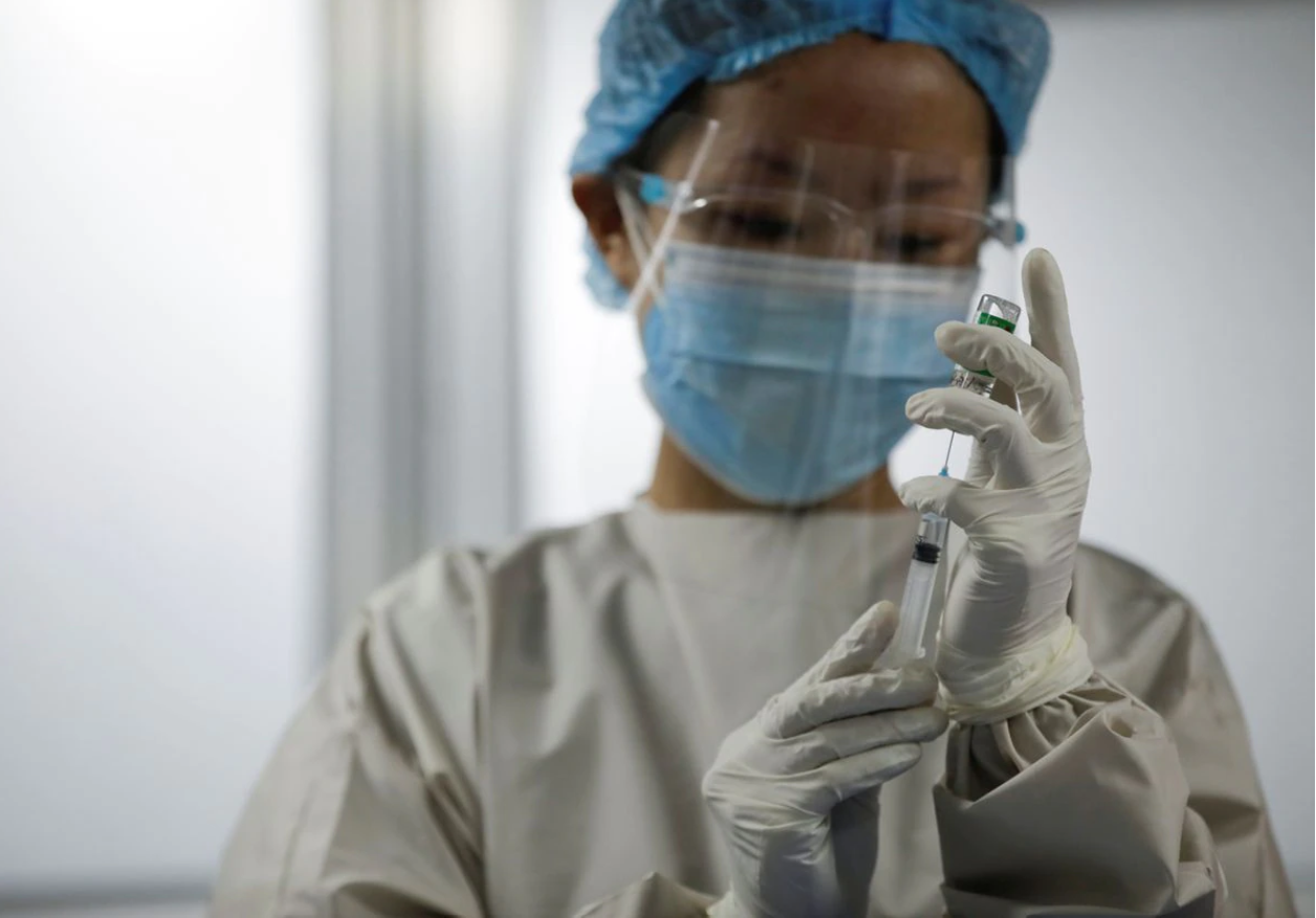 WHO urges vaccination for health workers as over 115,000 have died