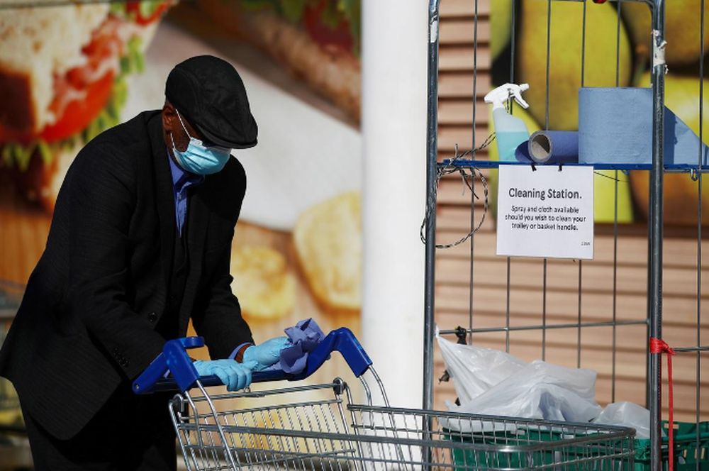 UK inflation dips but rate rise still forecast