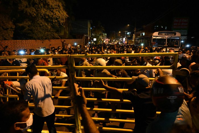 Lanka imposes curfew in capital after 20 injured in clashes