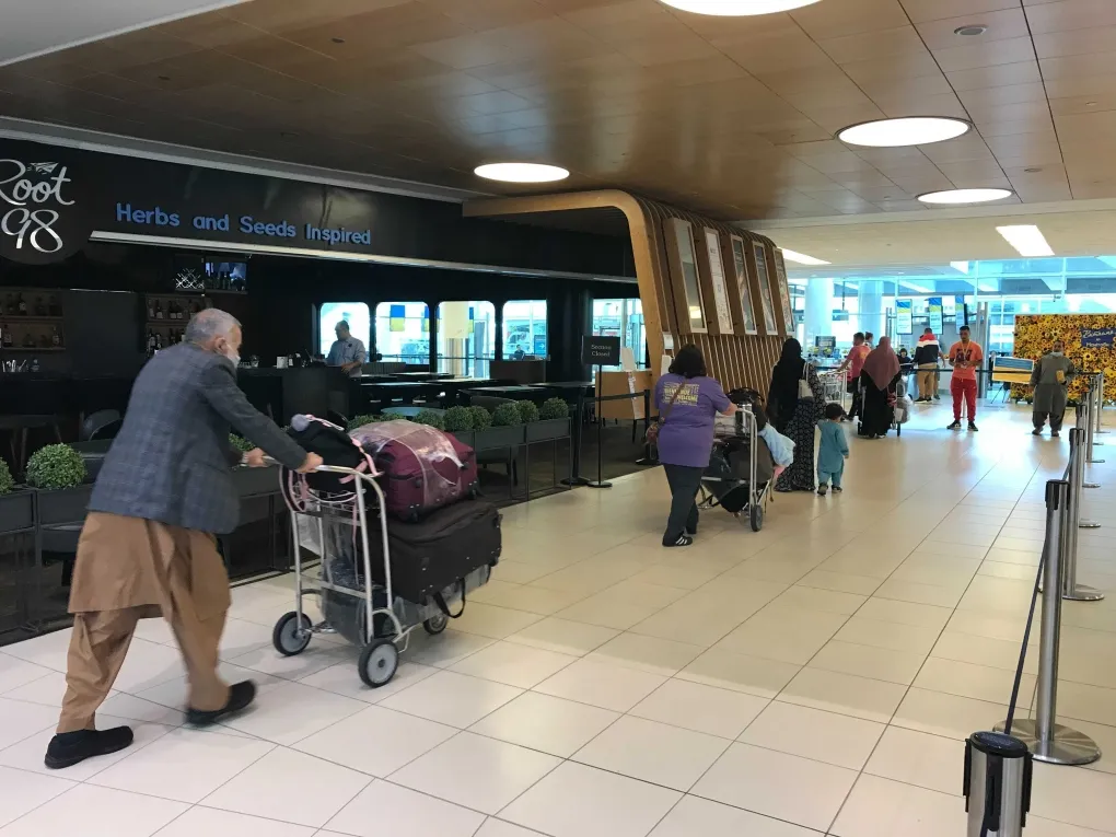 Charter flight carrying 324 Afghan refugees arrives in Canada’s Winnipeg