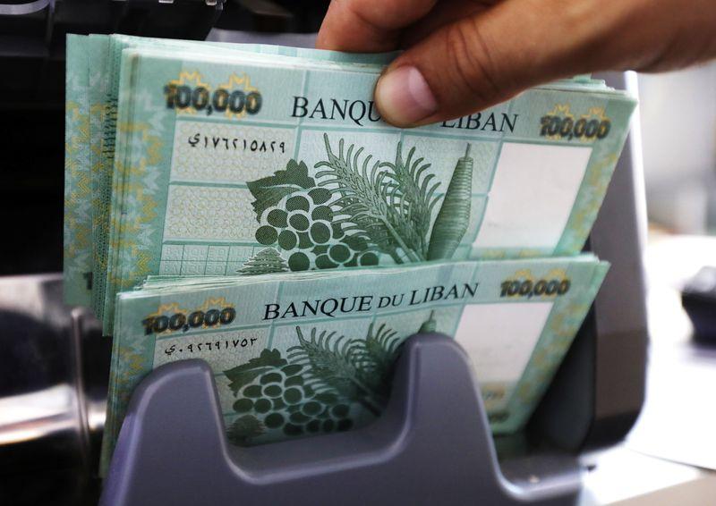 Lebanese currency hits record low amid bank closures
