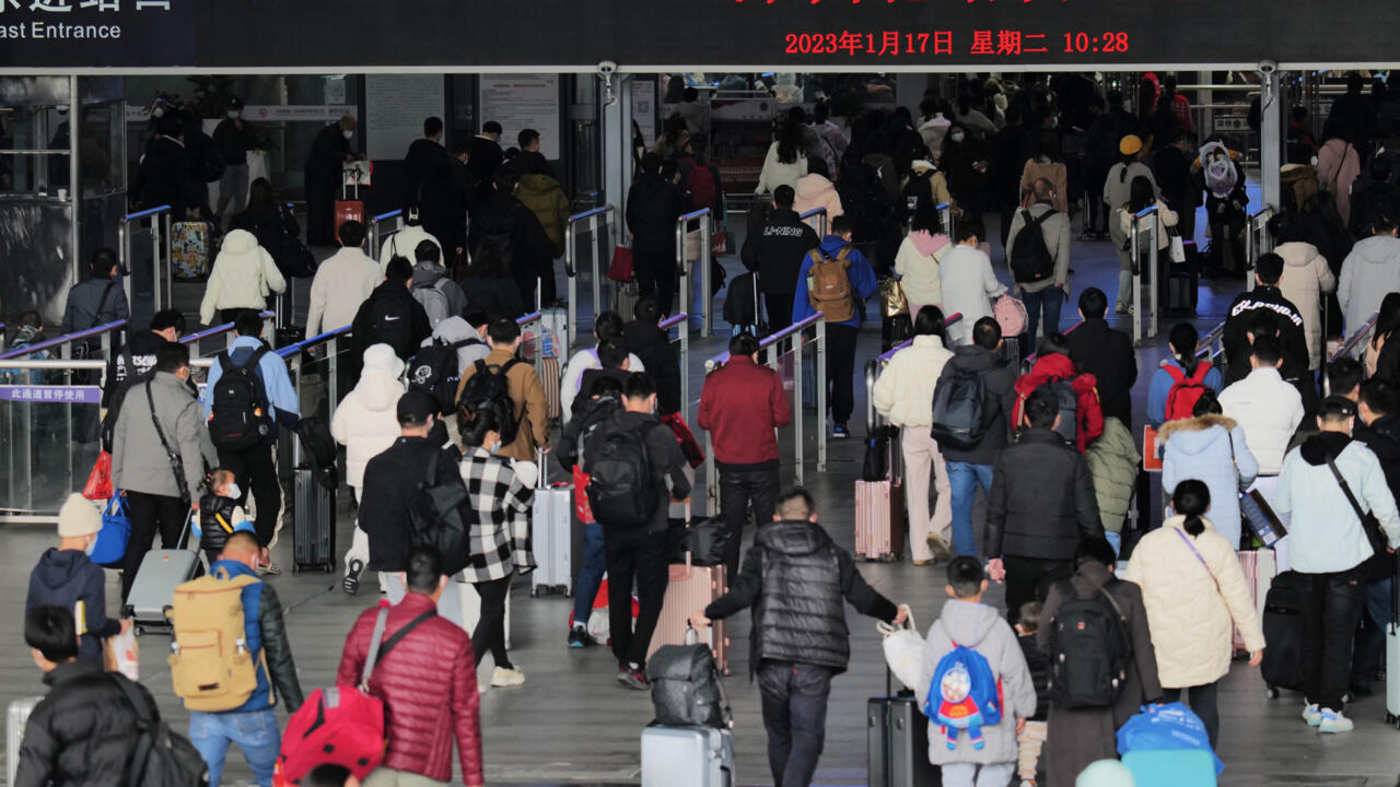 Tens of millions head home for China holidays as Xi flags Covid worry